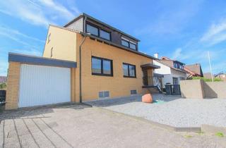 Haus kaufen in 41352 Korschenbroich, Attraktives Dreifamilienhaus in ruhiger Lage von Kleinenbroich