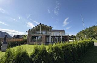 Mehrfamilienhaus kaufen in 25779 Hennstedt, Neuwertiges Mehrfamilienhaus mit 3 Ferienwohnungen und Blick auf die Eider