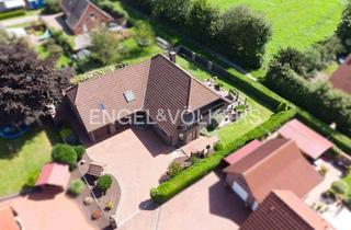 Einfamilienhaus kaufen in 26529 Rechtsupweg, Repräsentatives Einfamilienhaus mit Doppelgarage und großem Garten
