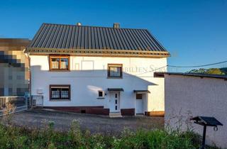 Einfamilienhaus kaufen in 35619 Braunfels, * Einfamilienhaus mit Doppelgarage in Braunfels-Bonbaden *