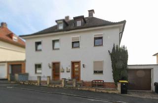 Doppelhaushälfte kaufen in 36251 Bad Hersfeld, Vermietete Doppelhaushälfte mit Südgarten und Zierteich in Bad Hersfeld