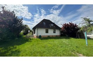 Einfamilienhaus kaufen in 30880 Laatzen, Einfamilienhaus mit großzügigen Garten und zwei Garagen