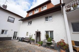 Haus kaufen in 61239 Ober-Mörlen, Ober-Mörlen: Schönes Wohnhaus mit viel Potenzial und Garten