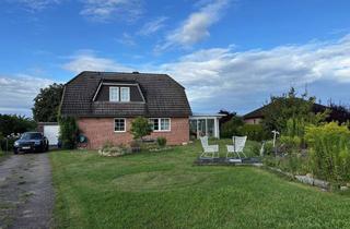 Einfamilienhaus kaufen in 21441 Garstedt, Exklusives Einfamilienhaus mit Wintergarten, Koiteich und großzügigem Grundstück in Garstedt