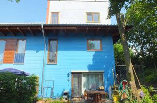 Reihenhaus kaufen in 65428 Rüsselsheim, Außergewöhnliches Reihenhaus in ruhiger Lage