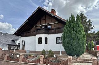Einfamilienhaus kaufen in 56653 Glees, Stilvolles Einfamilienhaus mit gut vermietbarer Einliegerwohnung und tollem Außenbereich