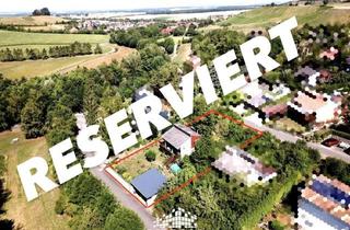 Haus kaufen in 97513 Michelau, RESERVIERT: WOHNEN WIE IM URLAUB: IHR NEUES ZUHAUSE MIT BLICK INS GRÜNE, GROßEM GARTEN UND CARPORT!