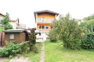 Haus kaufen in 74909 Meckesheim, Wohnvielfalt in Meckesheim: Dreifamilienhaus mit Anbau, Garten und Garagen