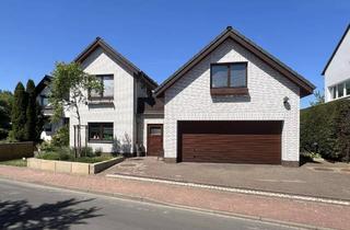 Einfamilienhaus kaufen in 30826 Garbsen, BÖTTGER bietet: Geräumiges Einfamilienhaus mit Einliegerwohnung in Feldrandlage in Schloß Ricklingen