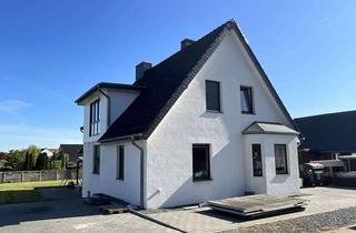 Haus kaufen in 31600 Uchte, Modernisiertes Zuhause mit zwei Wohneinheiten und schönem Grundstück in Uchte