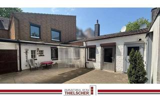 Einfamilienhaus kaufen in 52531 Übach-Palenberg, Vielseitiges Einfamilienhaus mit großem Garten, Garage – Ideal für Mehrgenerationen oder Handwerker