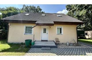 Einfamilienhaus kaufen in 16775 Löwenberger Land, Charmantes Einfamilienhaus mit Kaminofen, großem Garten und vielseitigen Nutzungsmöglichkeiten