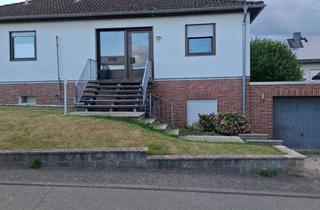 Haus kaufen in 34454 Bad Arolsen, Bungalow mit Einliegerwohnung in Diemelstadt-Rhoden