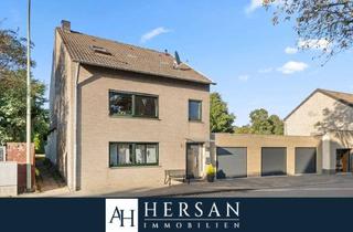 Einfamilienhaus kaufen in 52382 Niederzier, Freistehendes Einfamilienhaus mit drei Garagen und Wintergarten - Mehrgenerationenhaus geeignet!