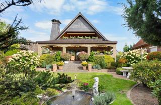 Einfamilienhaus kaufen in 30855 Langenhagen, Godshorn: Wunderschönes Einfamilienhaus mit Einliegerwohnung in idyllischer Lage