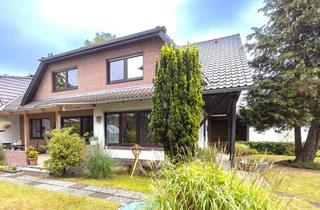 Doppelhaushälfte kaufen in 32339 Espelkamp, Doppelhaushälfte in Espelkamp mit 2 Wohneinheiten, großem Garten, Doppelgarage & PV-Anlage