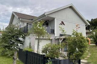 Haus kaufen in 35649 Bischoffen, Großzügiges, barrierefreies Wohnen mit attraktiver Nebeneinkunft