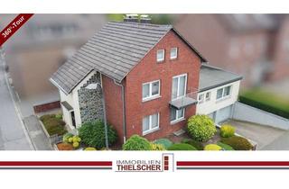 Haus kaufen in 52499 Baesweiler, Großzügiges Zweifamilienhaus mit Balkon, Terrasse, Garten und 2 Tiefgaragen im idyllischen Loverich