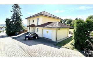 Einfamilienhaus kaufen in 35112 Fronhausen, Exklusives Einfamilienhaus mit großem Garten in idyllischer Sackgassenlage