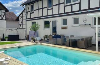 Einfamilienhaus kaufen in 34225 Baunatal, Von Historie zur Moderne: Einfamilienhaus mit Pool in begehrter Lage von Baunatal