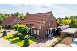 Einfamilienhaus kaufen in 26553 Dornum, Attraktives Einfamilienhaus mit Einliegerwohnung in ruhiger Sackgassenlage von Dornum