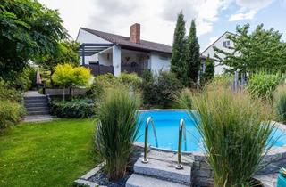 Haus kaufen in 65468 Trebur, Freistehendes Traumhaus mit Pool, großem Garten und ohne Sanierungsstau in Trebur-Geinsheim