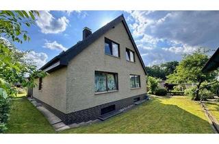 Haus kaufen in 27383 Scheeßel, Attraktives Anlageobjekt - 2 abgeschlossene Wohneinheiten mit XXL Garage