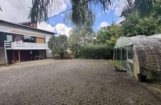 Einfamilienhaus kaufen in 37434 Gieboldehausen, Einfamilienhaus im Herzen Gieboldehausens mit großzügigem Garten, Pool, Garagen und reichlich Fläche