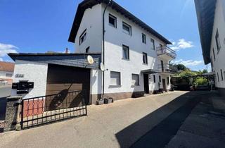 Einfamilienhaus kaufen in 63584 Gründau, Attraktives Wohnanwesen mit drei Wohneinheiten, Garagen, großem Innenhof und Garten!