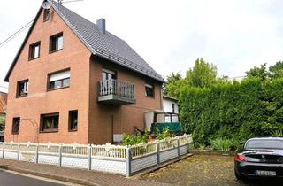 Haus kaufen in 56472 Nisterau, Zweifamilienhaus mit schönem Garten, langer Hofeinfahrt, 2 Garagen & Anbau aus 1992
