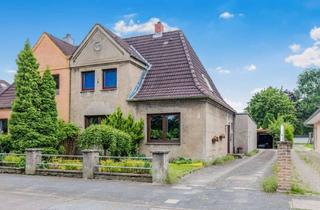 Doppelhaushälfte kaufen in 24539 Wittorf, Gestalten, wohnen, genießen – Großzügige Doppelhaushälfte mit viel Platz und großem Garten