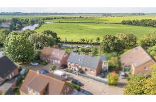 Doppelhaushälfte kaufen in 26723 Twixlum, Wasserblick! Modernisierte Doppelhaushälfte mit Traumgarten und Steganlage in Twixlum