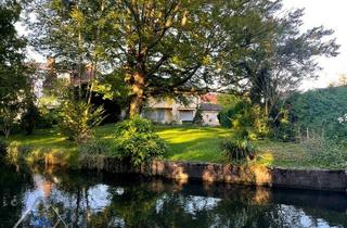 Einfamilienhaus kaufen in Fischerstr. 21, 82178 Puchheim, Idyllisch - Einzigartig - für die ganze Familie: Einfamilienhaus in einer Parkanlage mit Badeweiher