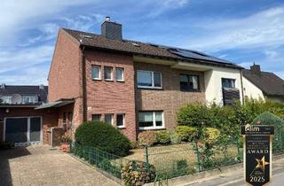 Doppelhaushälfte kaufen in 40721 Hilden, Modernisierungsbedürftige Doppelhaushälfte mit Garage und sonnigem Garten im Hildener Norden!