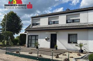 Doppelhaushälfte kaufen in 31715 Meerbeck, Attraktive Doppelhaushälfte mit Einliegerwohnung