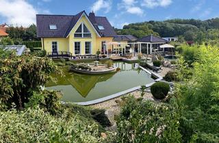 Haus kaufen in 04509 Löbnitz, Traumhaus in Löbnitz: Exklusives Architektenhaus mit Gartenparadies, Pool, Pavillon und Nebengebäude