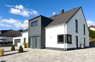 Einfamilienhaus kaufen in 65558 Gückingen, Modernes Einfamilienhaus mit Poolanlage und hochwertiger Ausstattung in Gückingen