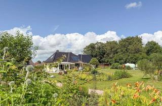 Haus kaufen in 25879 Süderstapel, Ruhig gelegenes Kleinod mit liebevoll gestaltetem Gartenparadies