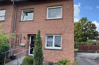 Haus kaufen in 59269 Beckum, Reiheneckhaus mit Terrasse, Gartenfläche, zwei Garagen und zwei Stellplätzen