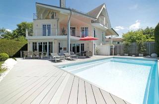 Villa kaufen in 82335 Berg, Zeitlose Eleganz – Exklusive Familienvilla mit Spa, Pool & sonnigem Garten. Toplage!