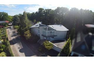 Villa kaufen in 25336 Elmshorn, Außergewöhnliches Architektenhaus am Waldrand - inspiriert von der Form eines Adlers