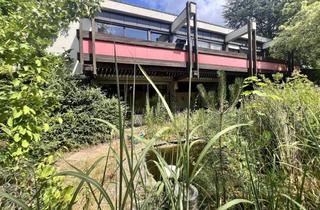 Haus kaufen in 97508 Grettstadt, Bemerkenswertes Wohnhaus mit Garage auf idyllischem Grundstück