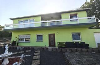 Einfamilienhaus kaufen in 55424 Münster-Sarmsheim, Münster-Sarmsheim - Großzügiges Einfamilienhaus mit ELW in ruhiger Top-Lage mit zwei Garagen