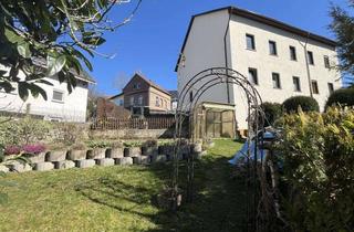 Doppelhaushälfte kaufen in 35781 Weilburg, Gepflegte Doppelhaushälfte mit zwei Wohnungen und schönem Gartengrundstück in Weilburg - Ahausen