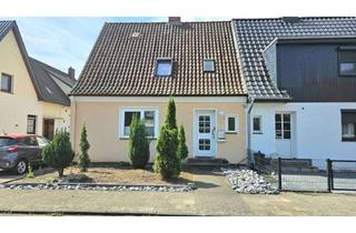 Doppelhaushälfte kaufen in 31582 Nienburg, Charme der 30er trifft Familienkomfort – Doppelhaushälfte mit Charakter und Garten in Holtorf