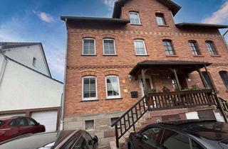 Doppelhaushälfte kaufen in 34314 Espenau, Doppelhaushälfte mit Klinkerfassade auf drei Etagen in zentraler Lage von Espenau!