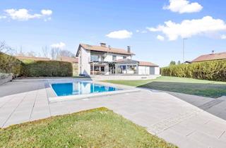 Haus kaufen in 83416 Saaldorf-Surheim, Großzügiges EFH mit Pool, mehreren Garagen & zusätzlicher Bebauungsmöglichkeit eines Reihenendhauses