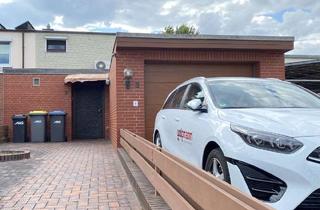 Reihenhaus kaufen in 28816 Stuhr, Reihenhaus in schöner Wohnstraße mit zwei Garagen