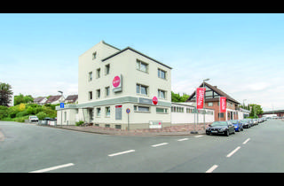 Anlageobjekt in 31785 Hameln, Attraktives Wohn- und Geschäftshaus mit Kfz-Betrieb und drei Wohneinheiten