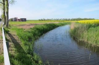 Grundstück zu kaufen in Cappel-Neufelder Sieltrift 27, 27639 Nordholz, mit 56 Meter Uferlinie, mit Blick zum Nordseedeich, Turmbau mit FernSeeSicht zur Insel Neuwerk mögl.